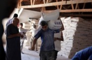 (أحد مراكز توزيع مساعدات أونروا في غزة)