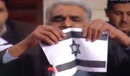 خلال تمزيق علم الكيان الصهيوني في البرلمان التونسي