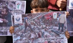 غزة- خلال الوقفة التضامنية مع أهالي مخيم خان الشيح