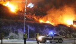 الحرائق تنتشر و الاحتلال يطلب مساعدات دولية لإخمادها