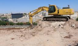 تعمل جرافة في موقع بناء المركز الصحي الجديد للأونروا في منطقة الزهور (بالقرب من عمان) - الحقوق محفوظة للأونروا ، 2019. تصوير دانية البطاينة.