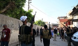 انتشار لعناصر الأمن الوطني في أحد شوارع المخيم، صورة أرشيفية