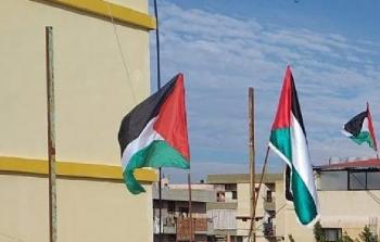 أهالي مُخيّم نهر البارد يُشاركون في حملة رفع العلم الفلسطيني