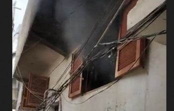 المنزل المحترق في مخيم النيرب للاجئين الفلسطينيين في حلب