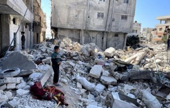 أنقاض مبنى في مخيم الرمل الفلسطيني في اللاذقية - وكالة سبوتنيك