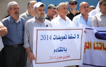 وقفة سابقة للمتضررين من عدوان 2014 أمام مقر أونروا في قطاع غزة