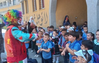 تنفيذ النشاط مع أطفال إحدى مدارس وكالة أونروا