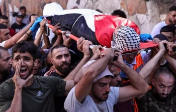 من تشييع الطفل غسان زهران في قرية دير أبو مشعل - تموز/ يوليو 2024 (GETTY)