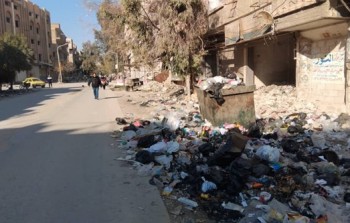 النفايات منتشرة في مخيم اليرموك