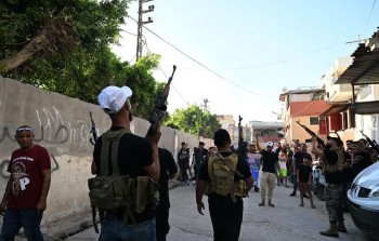 انتشار لعناصر الأمن الوطني في أحد شوارع المخيم، صورة أرشيفية