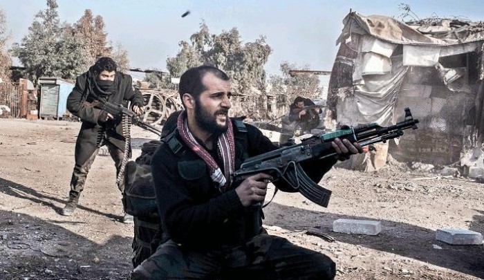 صورة أرشيفية لأحد المقاتلين في درعا