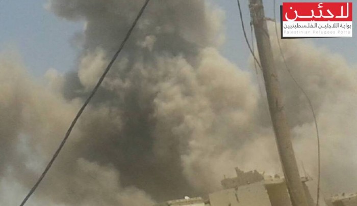 الدخان المتصاعد جراء قصف النظام لمخيم درعا