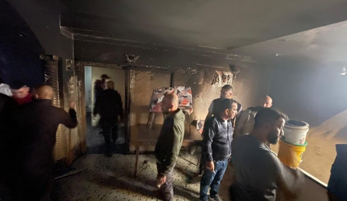 منزل احرقه الاحتلال في مخيم عسكر / وكالات